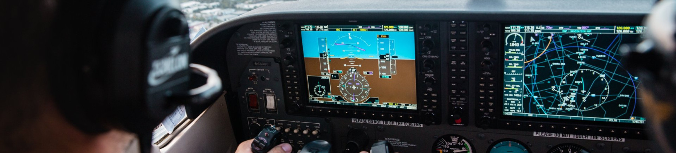 cockpit-view-of-pilot-flying-plane.jpg